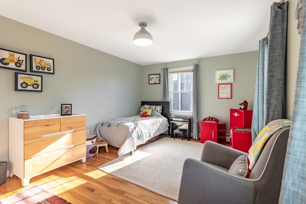 4 Abernathy Way Marblehead, MA 01945 - Photo 15 of 28 a bedroom with furniture and a window