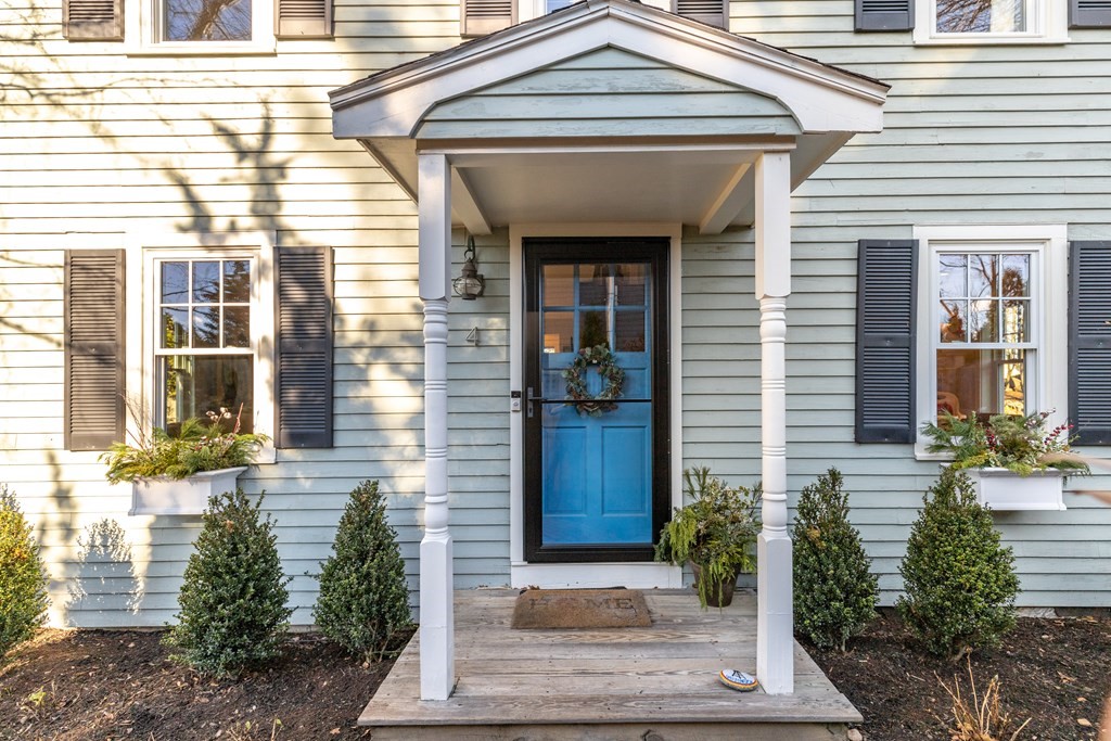 4 Abernathy Way Marblehead, MA 01945 - Photo 2 of 28 a front view of a house with a yard