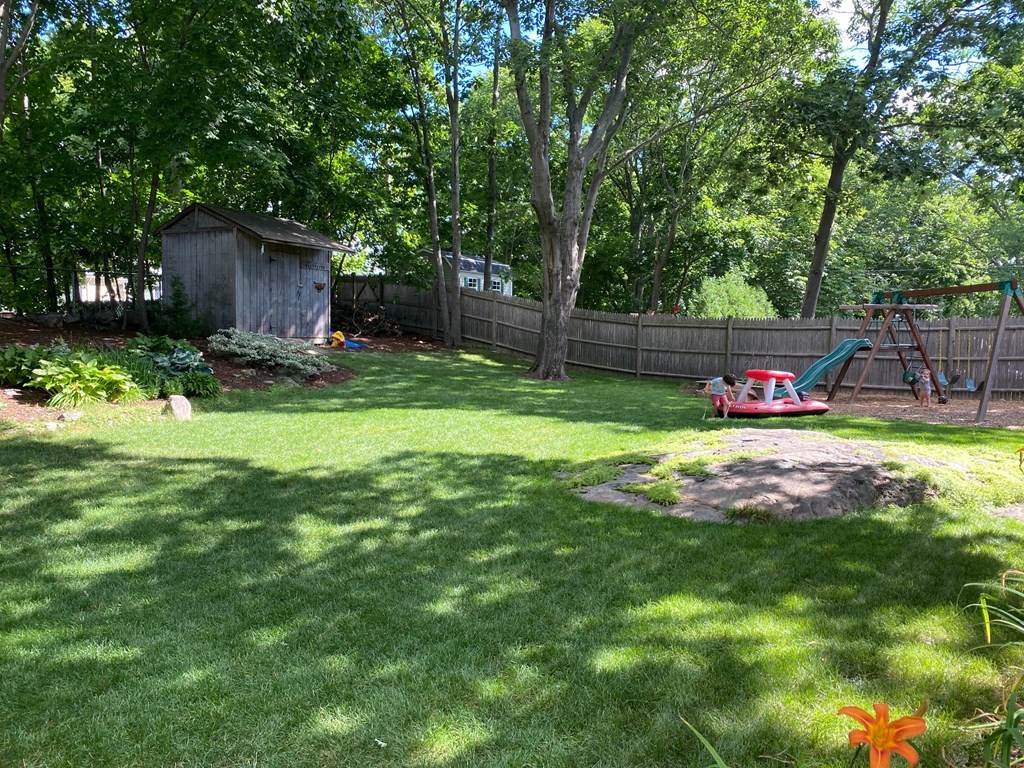 4 Abernathy Way Marblehead, MA 01945 - Photo 26 of 28 a view of backyard with a garden and trees