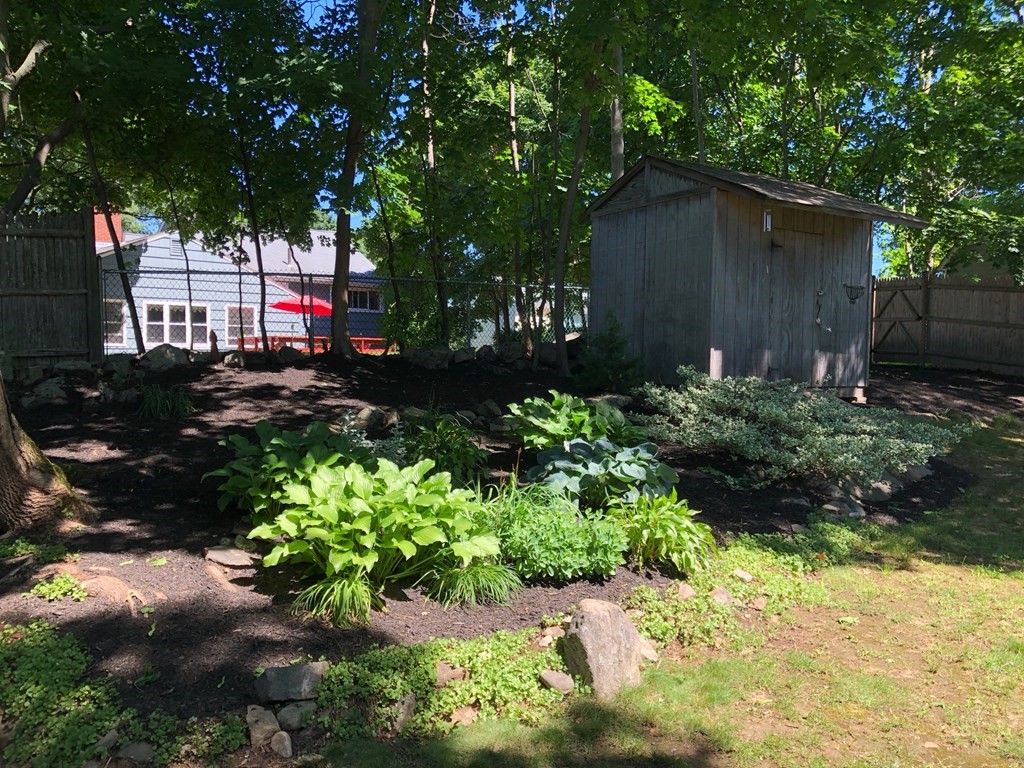 4 Abernathy Way Marblehead, MA 01945 - Photo 27 of 28 a front view of a house with a yard