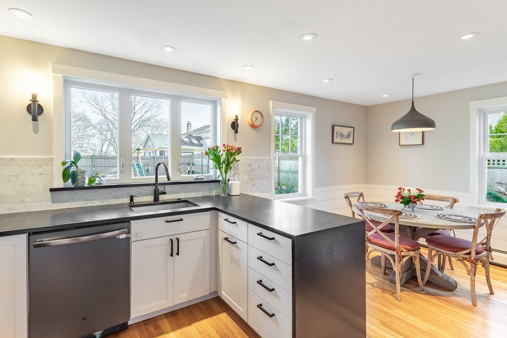 4 Abernathy Way Marblehead, MA 01945 - Photo 10 of 28 a kitchen with a sink stove and cabinets