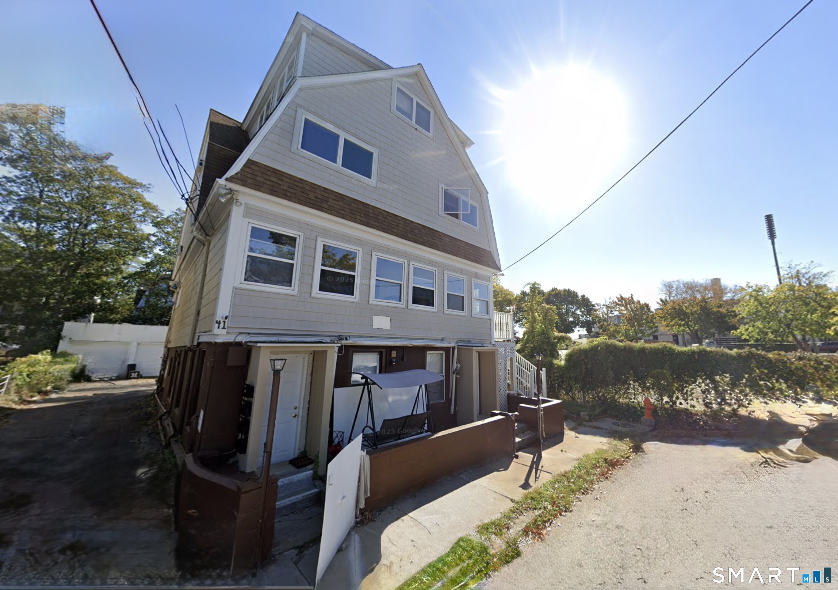 41 Stuart Avenue New London, CT 06320 - Photo 2 of 4 a view of a house with wooden fence