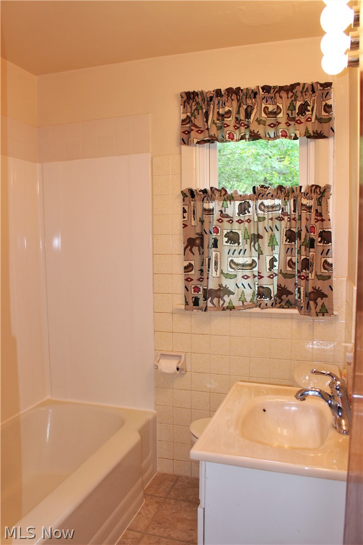 5944 Highland Road Cleveland, OH 44143 - Photo 14 of 20 Bathroom on the first floor with newer floor.
