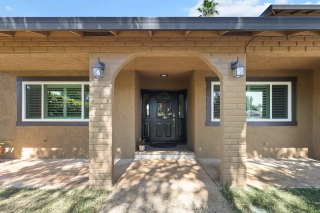 a view of a entryway door of the house