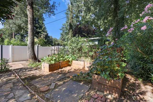 a backyard of a house with lots of green space