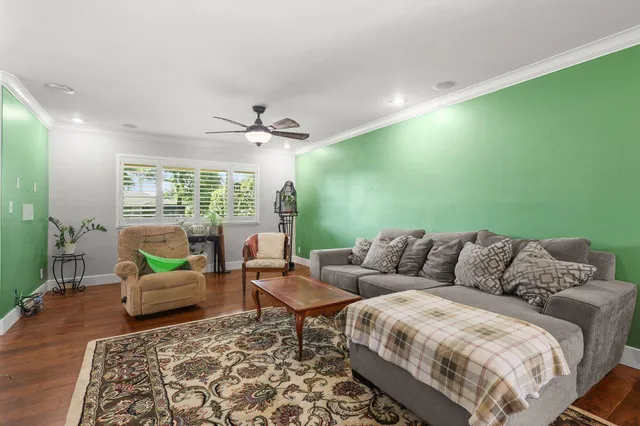 a living room with furniture and a table