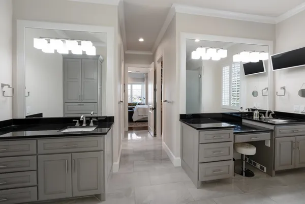 a kitchen with a sink and cabinets