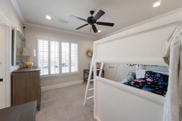 a room with gym equipment and a large window