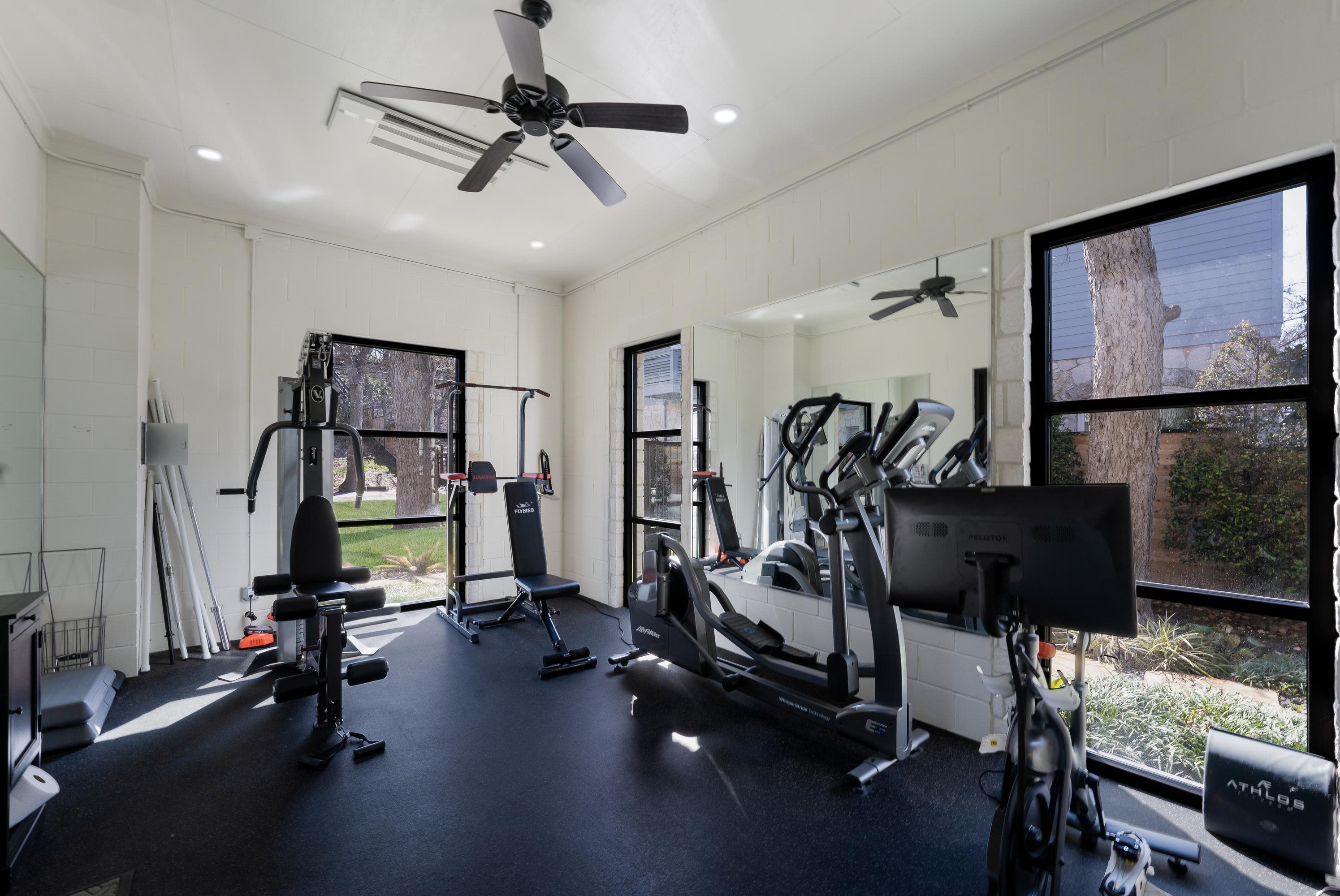 232 Laguna Rio Seguin, TX 78155 - Photo 28 of 30 a view of a room with gym equipment