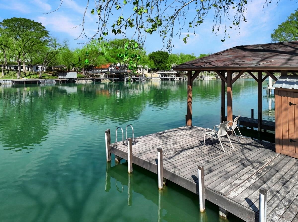 232 Laguna Rio Seguin, TX 78155 - Photo 6 of 30 a view of a wooden deck with furniture and garden