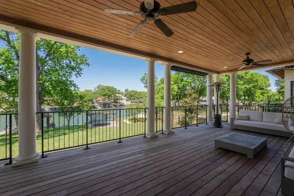 a view of a deck with wooden floor and outdoor space