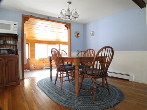 16 Herring Run Road Sandwich, MA 02537 - Photo 15 of 29 a view of a dining room with furniture window and wooden floor