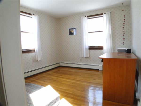 16 Herring Run Road Sandwich, MA 02537 - Photo 18 of 29 a view of a room with wooden floor and a window
