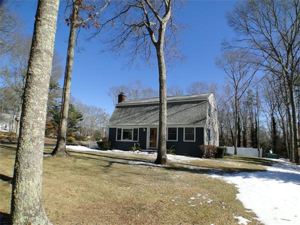 16 Herring Run Road Sandwich, MA 02537 - Photo 9 of 29 a front view of a building with street view