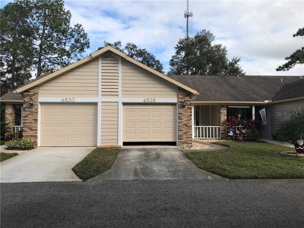 4528 Slippery Rock Road New Port Richey, FL 34653 - Photo 1 of 1 Front Yard and Porch