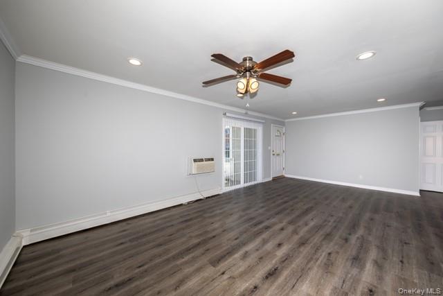 65 Friendly Court, Unit FC65 Babylon, NY 11702 - Photo 4 of 8 a view of a big room with wooden floor and windows