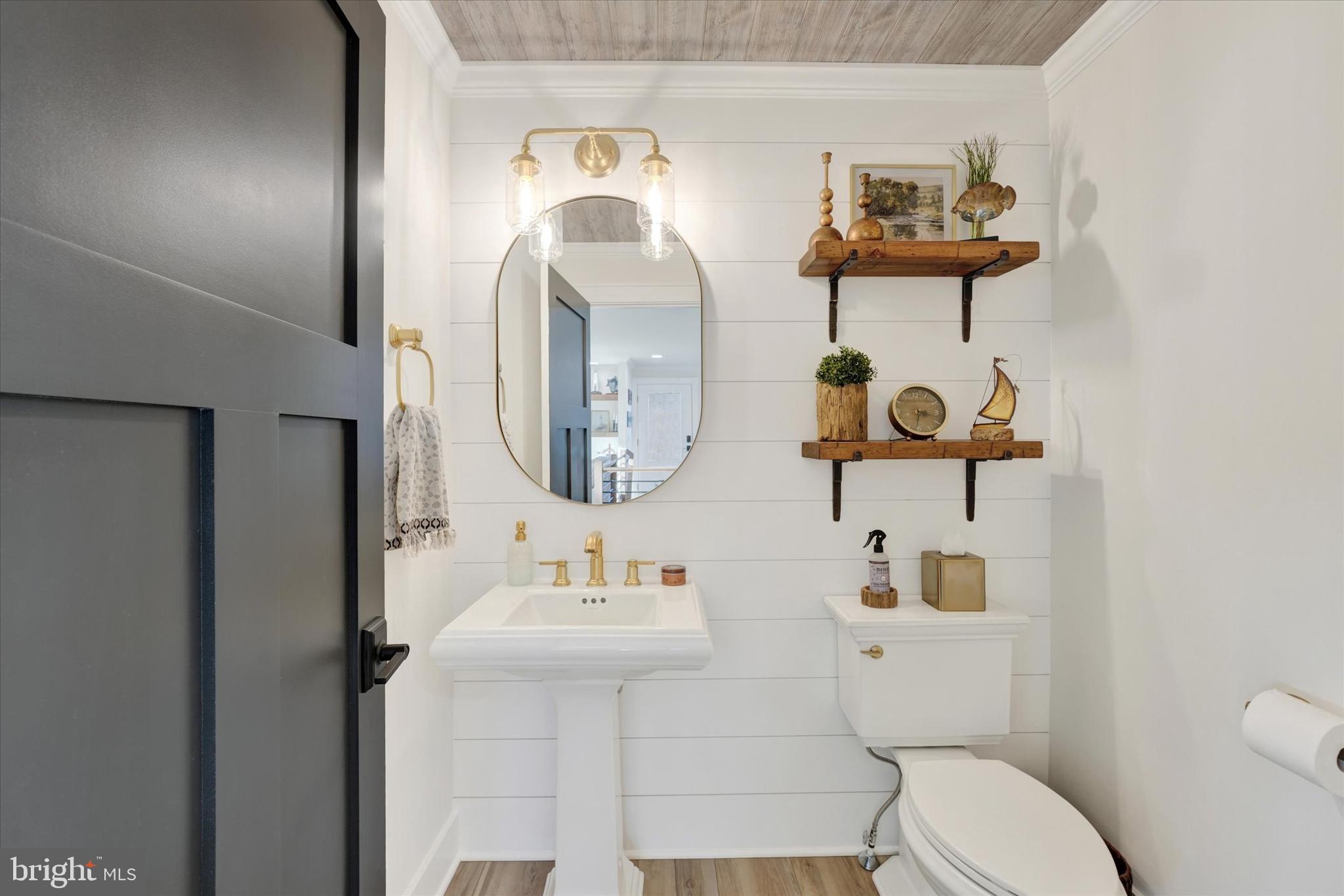 147 Elkmore Road Elkton, MD 21921 - Photo 20 of 52 Convenient Half Bath features Shiplap Accent Wall