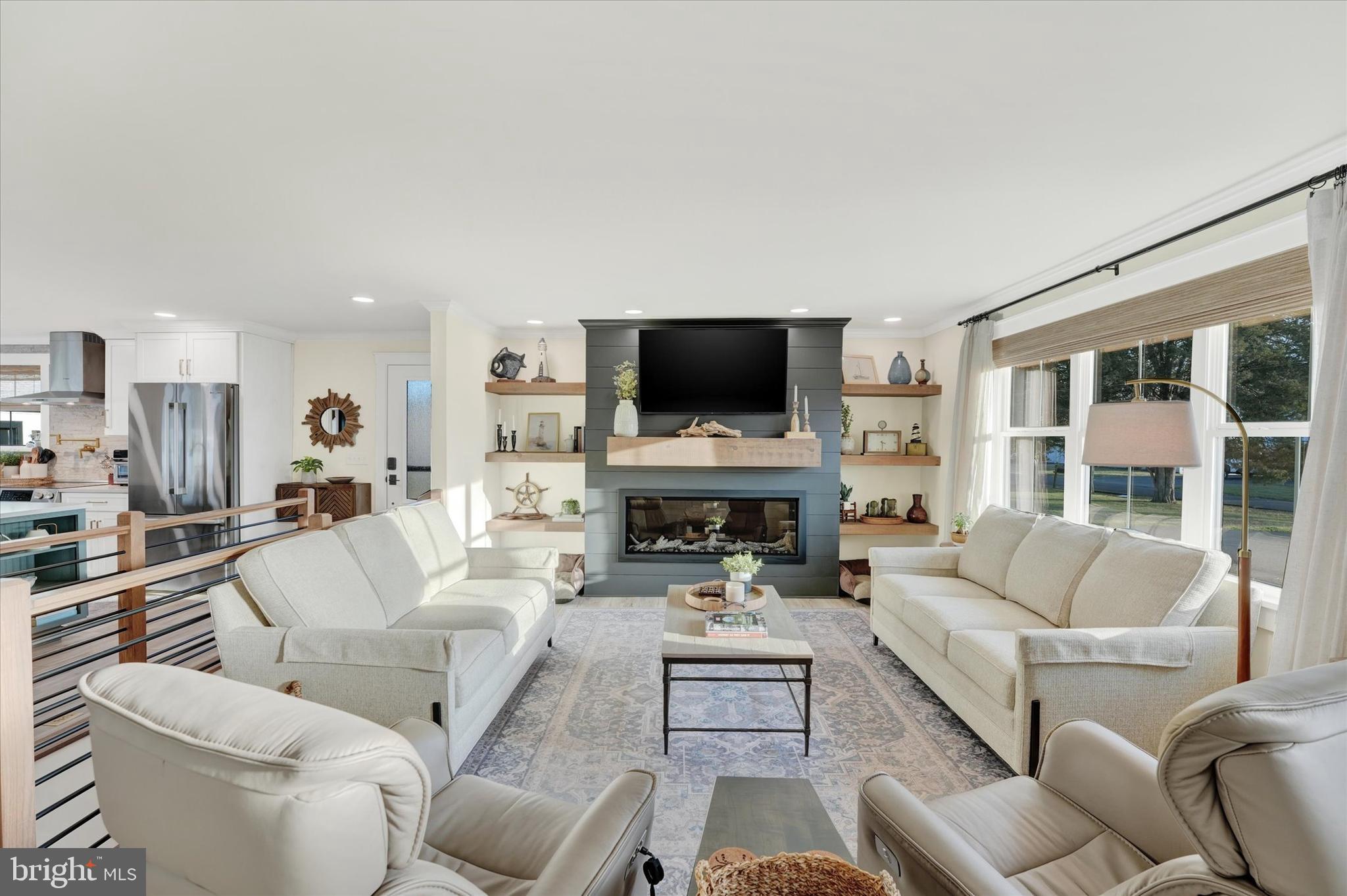 147 Elkmore Road Elkton, MD 21921 - Photo 6 of 52 Sun Drenched Living Room with Electric Fireplace