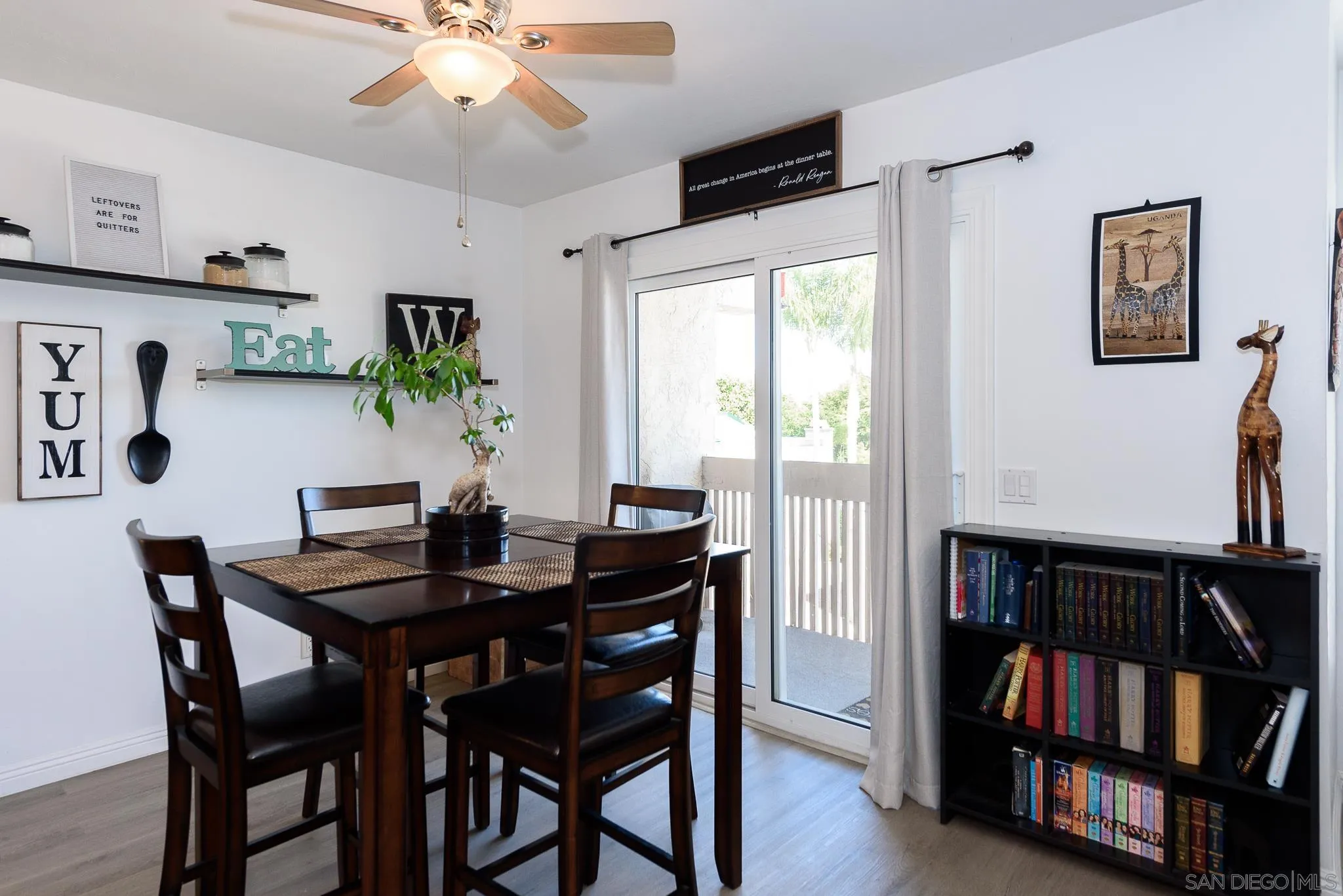 712 Silver Drive Vista, CA 92083 - Photo 11 of 32 a view of a livingroom with furniture and a bookshelf