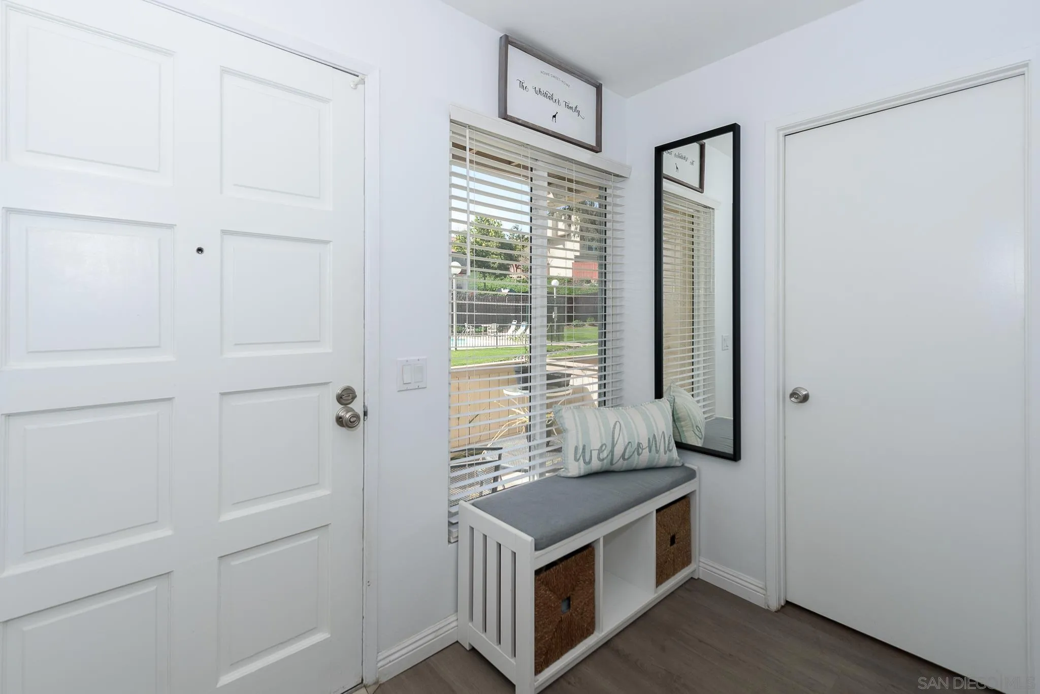 712 Silver Drive Vista, CA 92083 - Photo 13 of 32 a view of cabinets and wooden floor