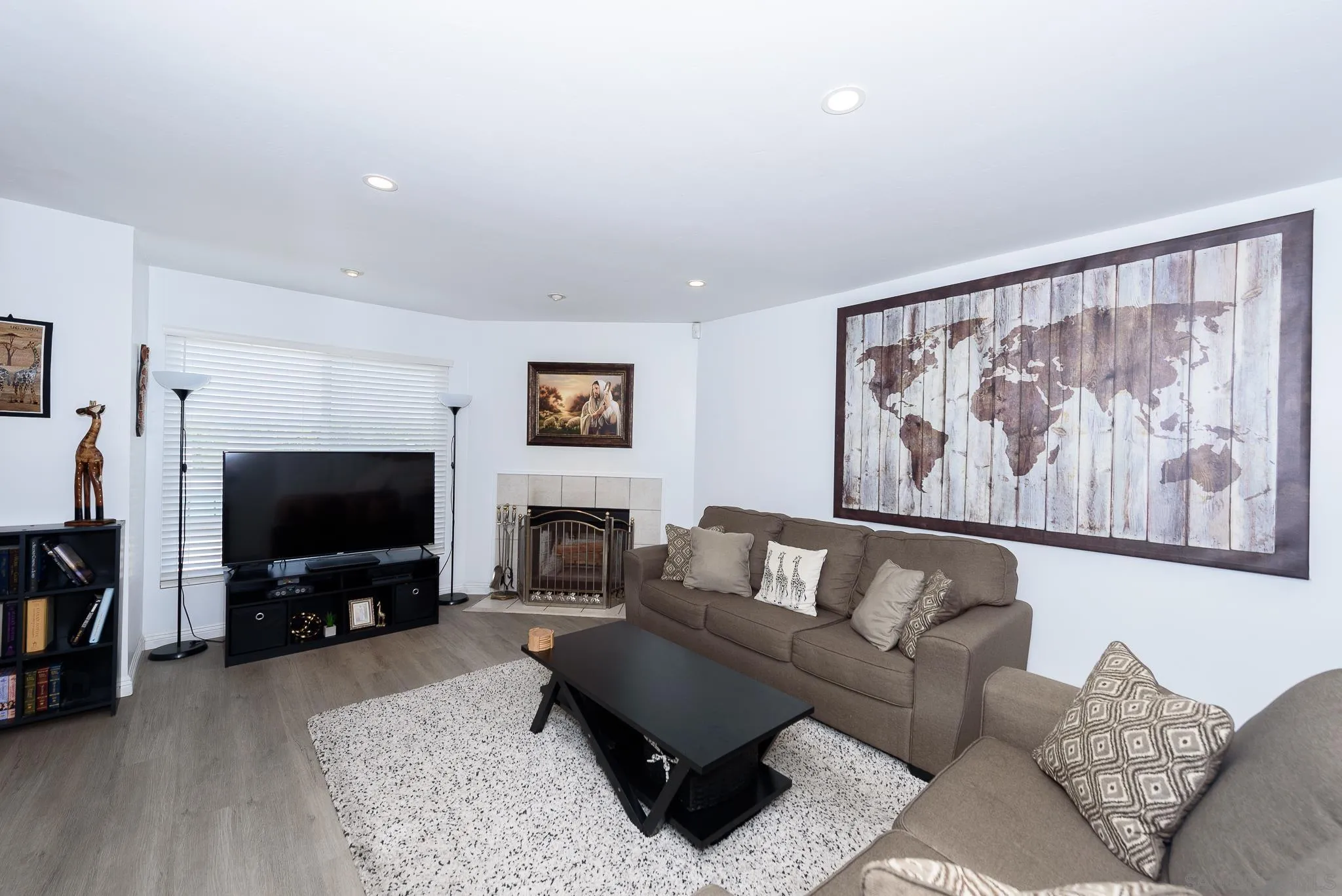 712 Silver Drive Vista, CA 92083 - Photo 14 of 32 a living room with furniture and a flat screen tv