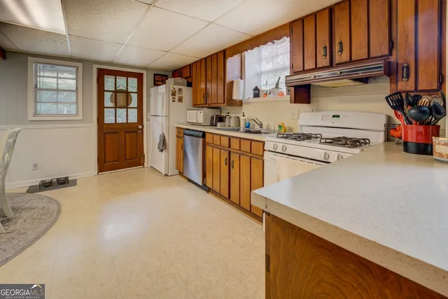 a bedroom with a bed and a closet