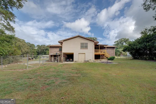 a view of a chairs and tables in patio