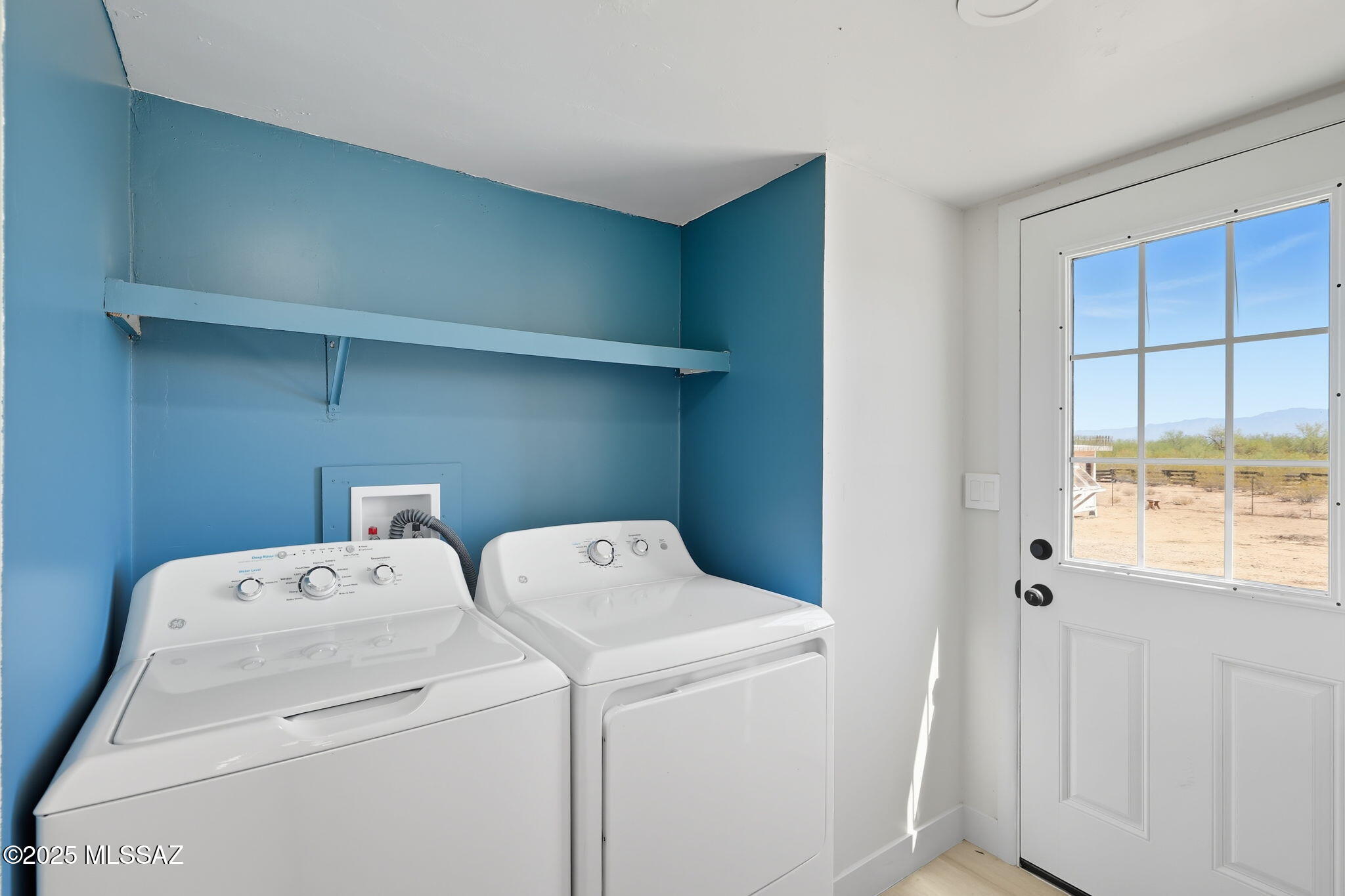 8790 North Trico Road Marana, AZ 85653 - Photo 24 of 35 a utility room with dryer and washer
