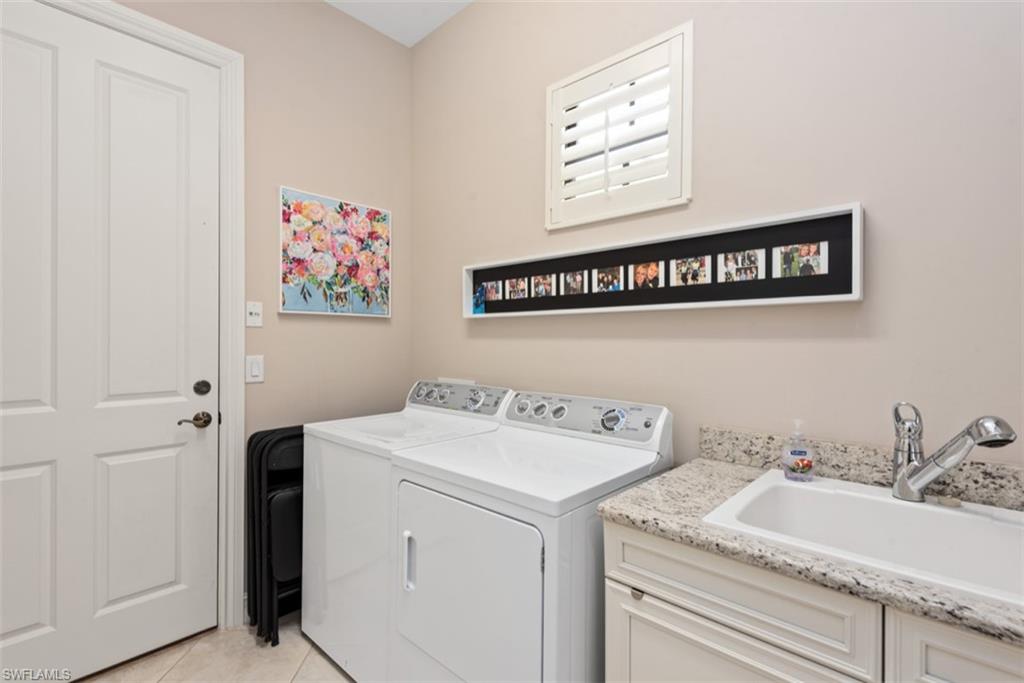 7457 Moorgate Point Way Naples, FL 34113 - Photo 11 of 24 LAUNRY ROOM
