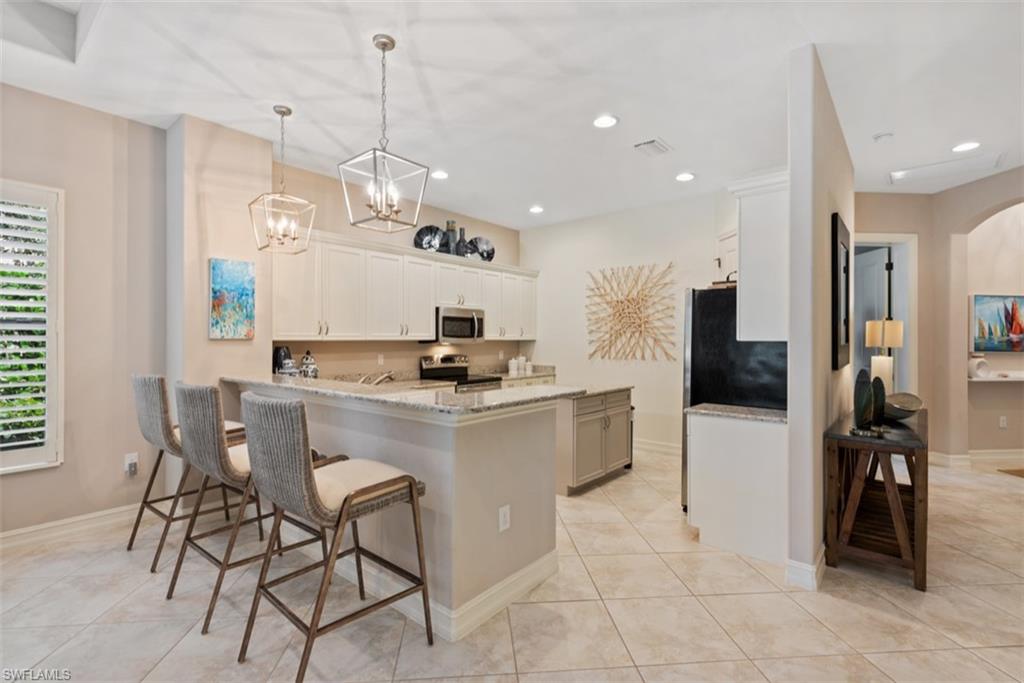 7457 Moorgate Point Way Naples, FL 34113 - Photo 9 of 24 KITCHEN