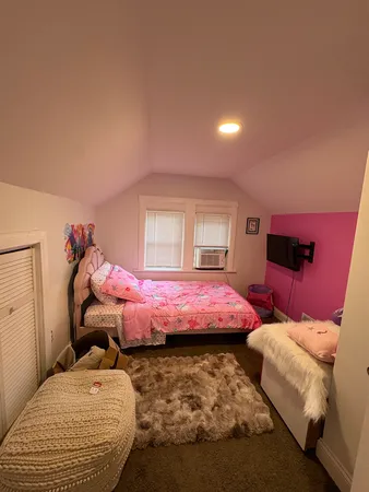 a bathroom with a sink a toilet and a shower