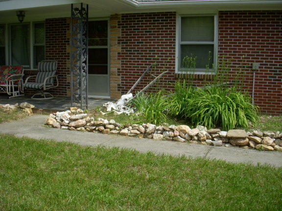 293 Huckleberry Ridge Road Northeast Floyd, VA 24091 - Photo 5 of 29 a view of a backyard with plants and patio