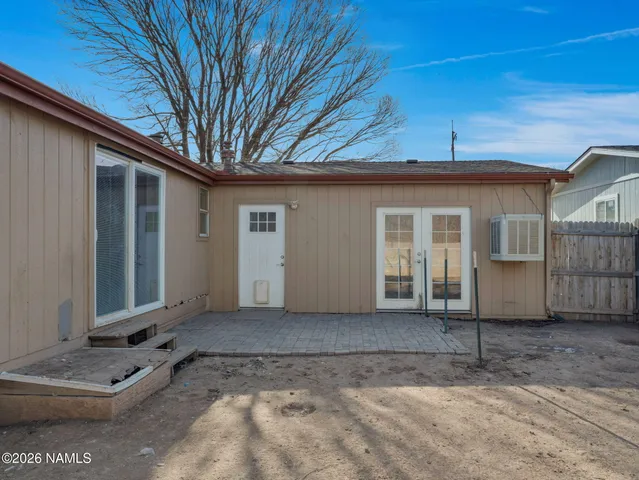 a view of backyard of a house