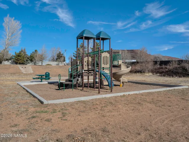a view of a lake with a yard
