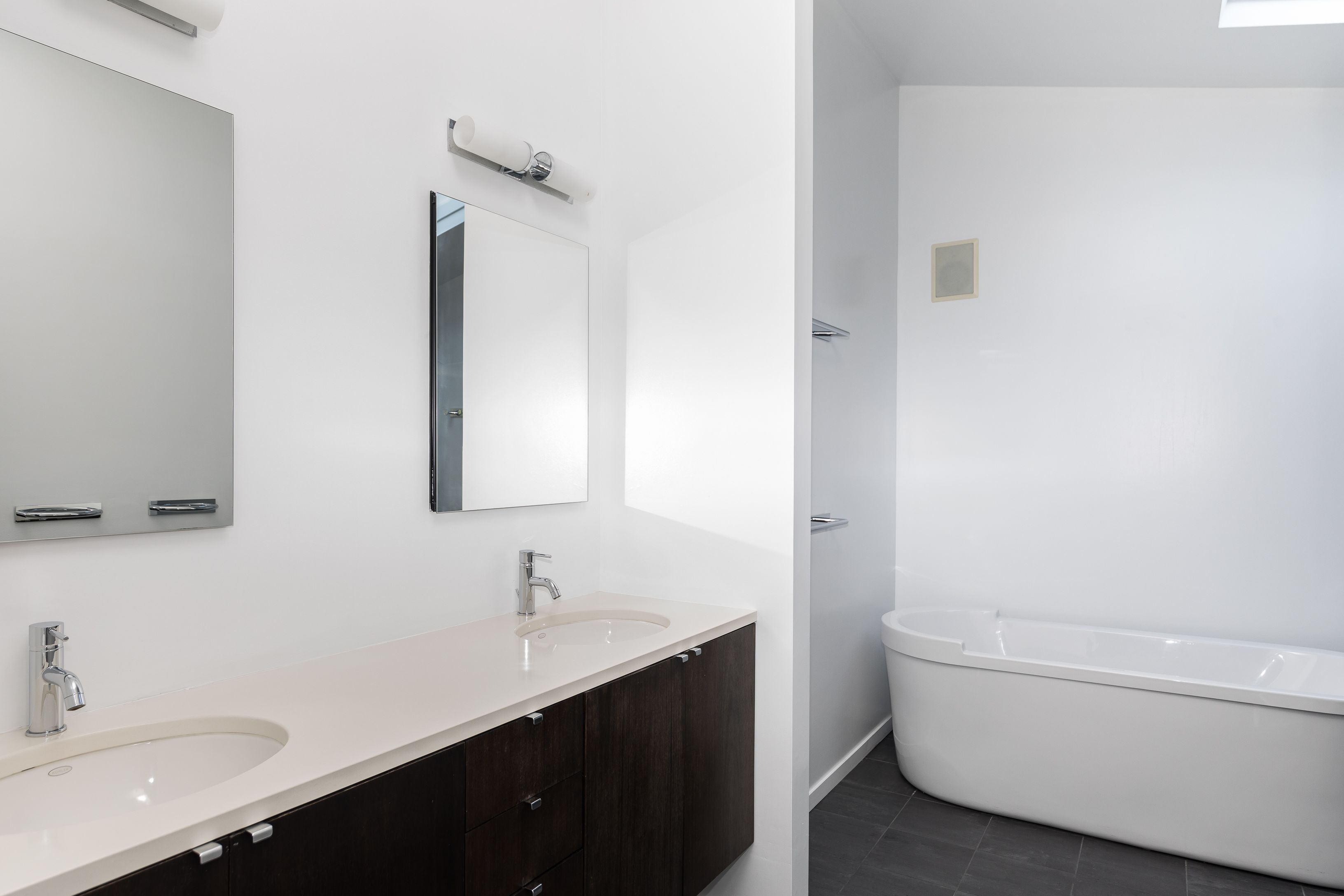 132 Springy Banks Road East Hampton, NY 11937 - Photo 21 of 35 a bathroom with a sink and a mirror