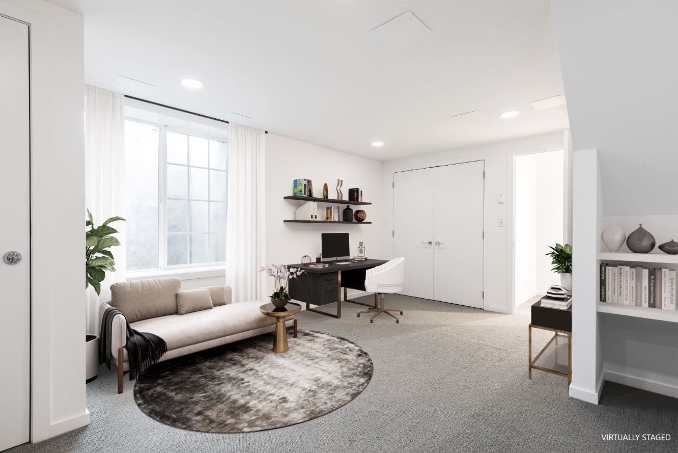 132 Springy Banks Road East Hampton, NY 11937 - Photo 33 of 35 a living room with furniture and a window