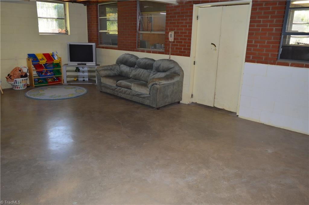 402 Springwood Road Asheboro, NC 27205 - Photo 17 of 21 Swinging door exit into the basement garage.