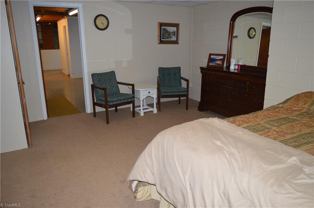 402 Springwood Road Asheboro, NC 27205 - Photo 18 of 21 Basement bedroom is heated, but not cooled.