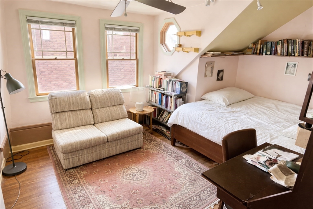 53 Hillside Street, Unit 2 Boston, MA 02120 - Photo 6 of 10 a living room with furniture and a window