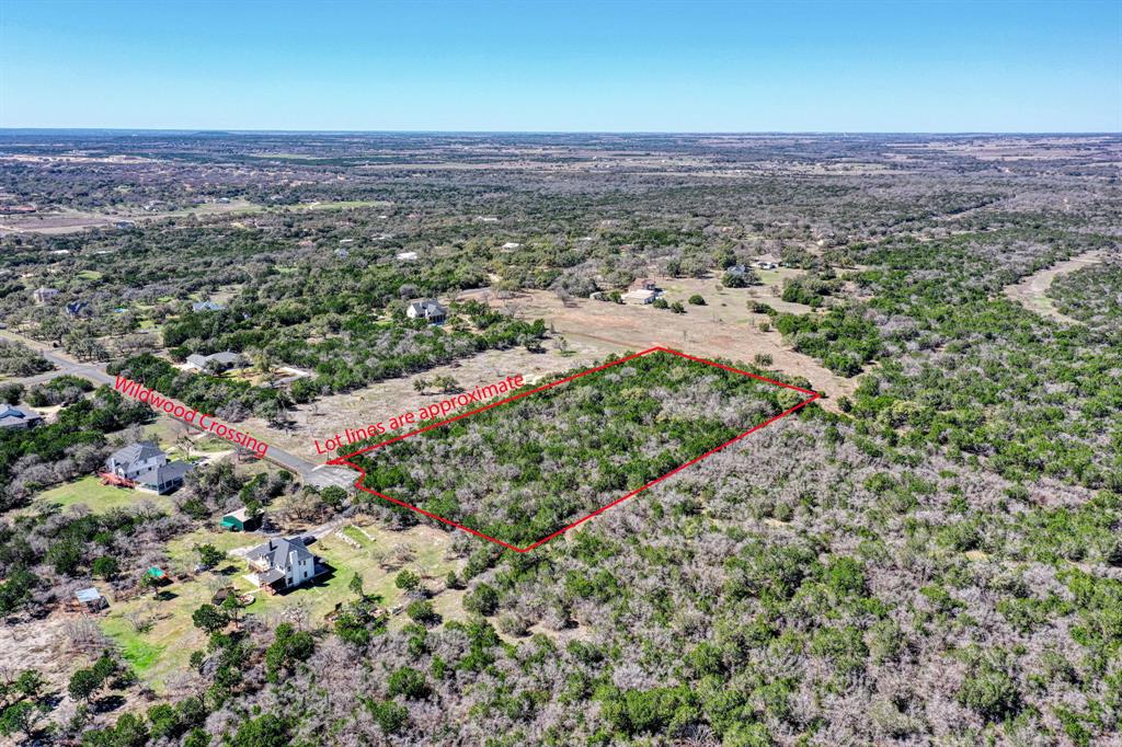 1110 Wildwood Crossing Georgetown, TX 78633 - Photo 10 of 11 an aerial view of a house with a yard
