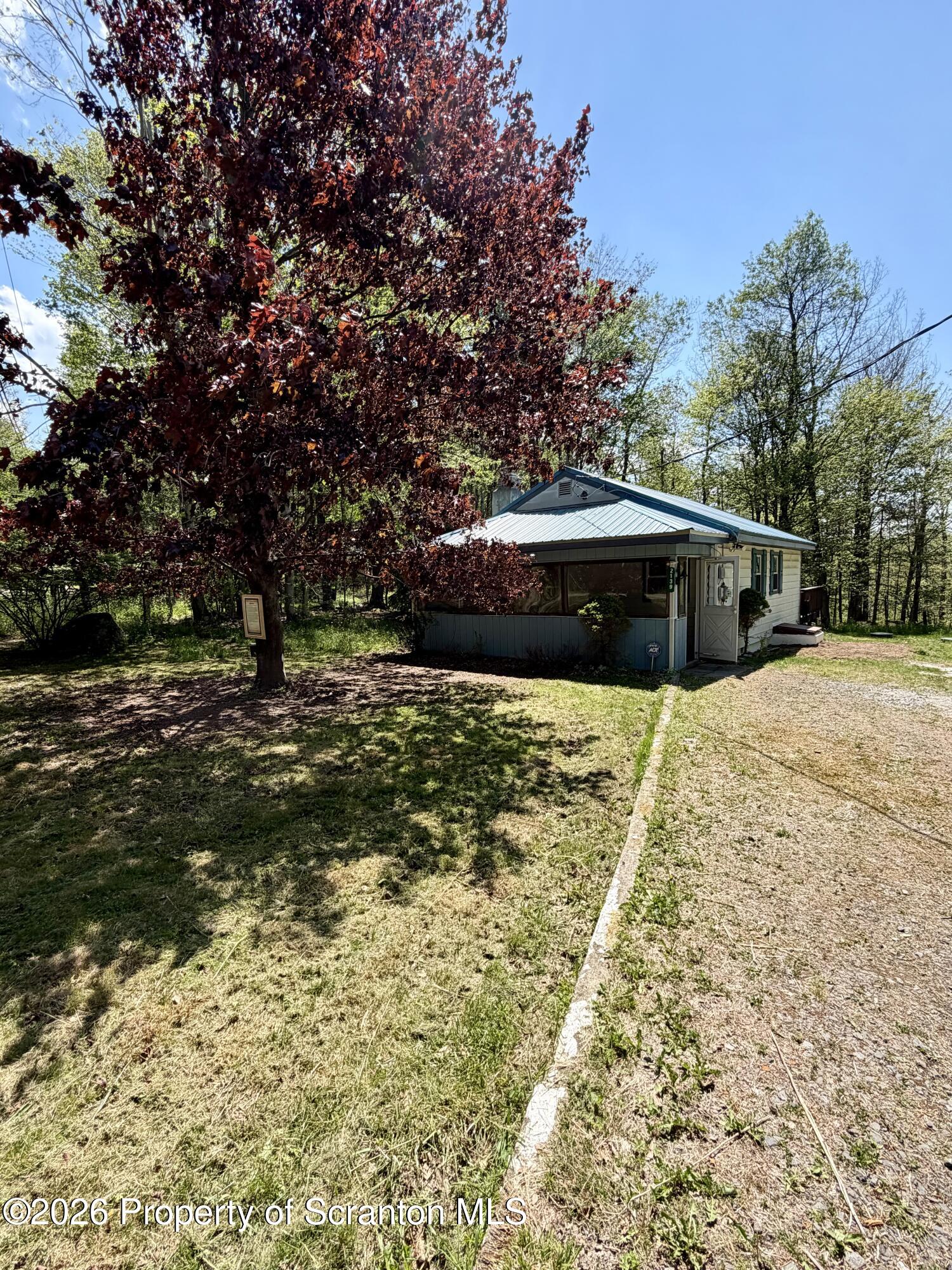 2139 Fawn Path Gouldsboro, PA 18424 - Photo 1 of 9 a view of swimming pool with a yard