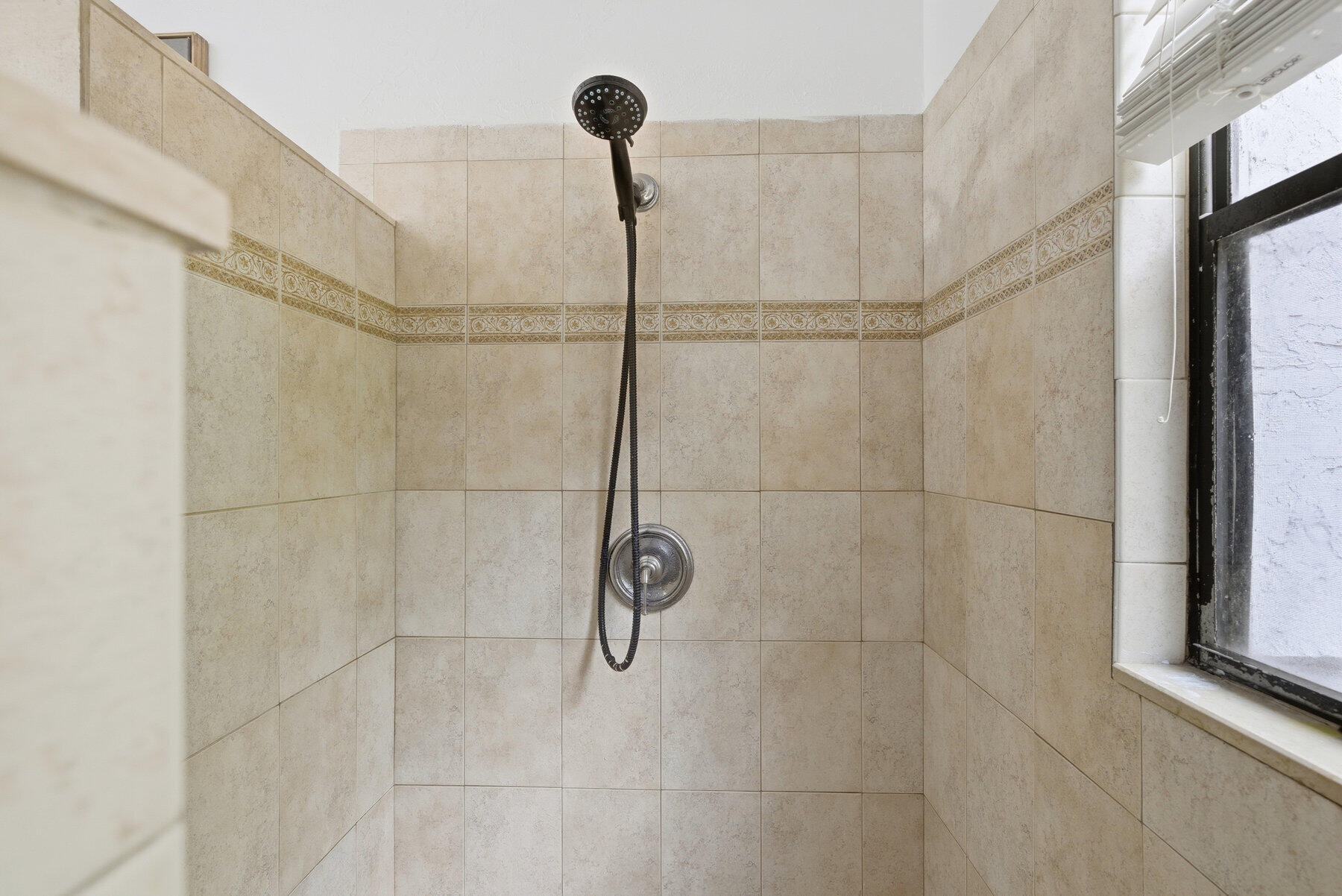 17251 38th Road North Loxahatchee, FL 33470 - Photo 16 of 35 a bathroom with a shower