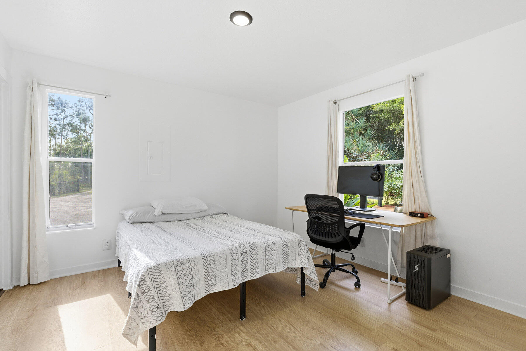 17251 38th Road North Loxahatchee, FL 33470 - Photo 20 of 35 a view of a workspace with furniture and a window