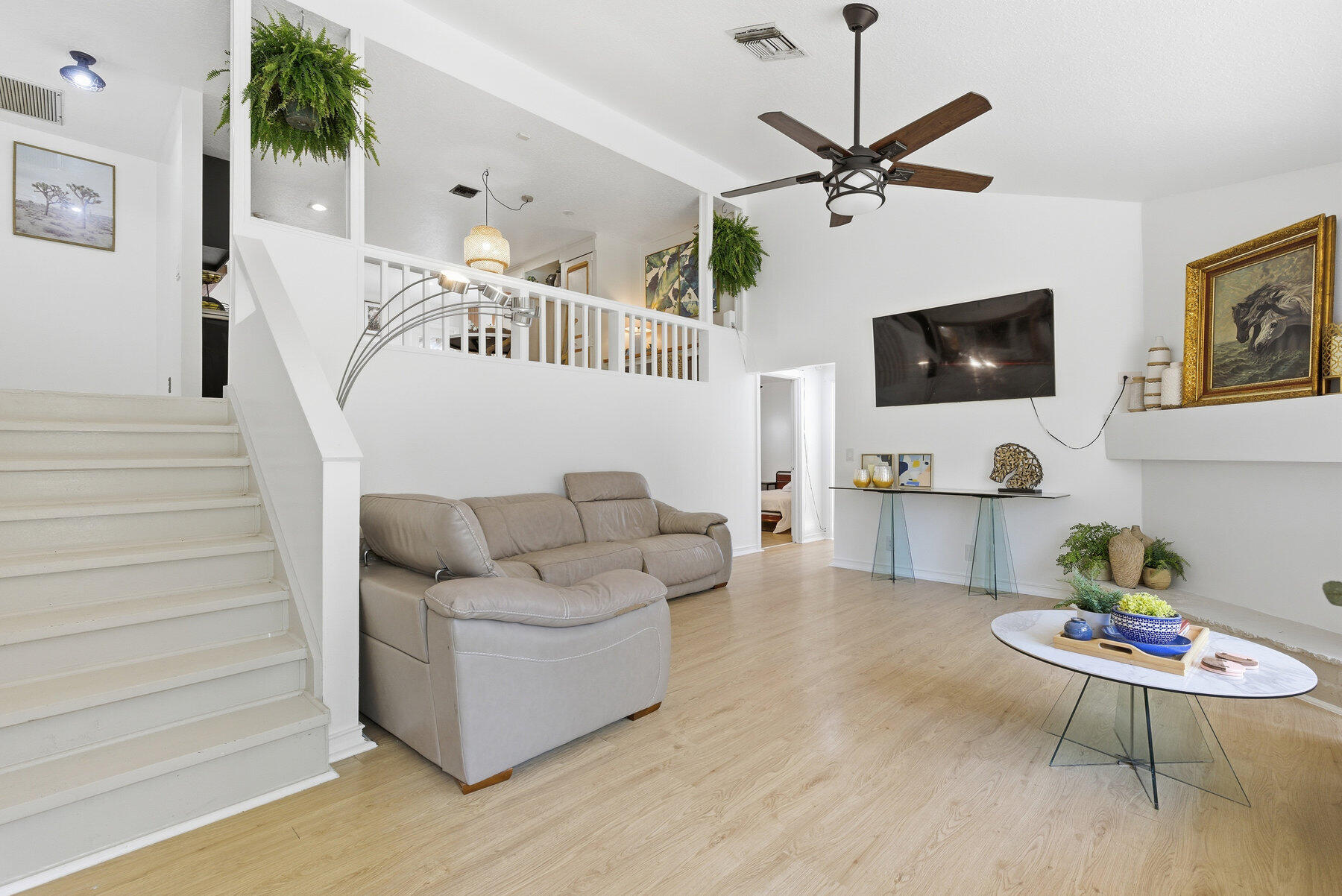 17251 38th Road North Loxahatchee, FL 33470 - Photo 2 of 35 a living room with furniture and a flat screen tv