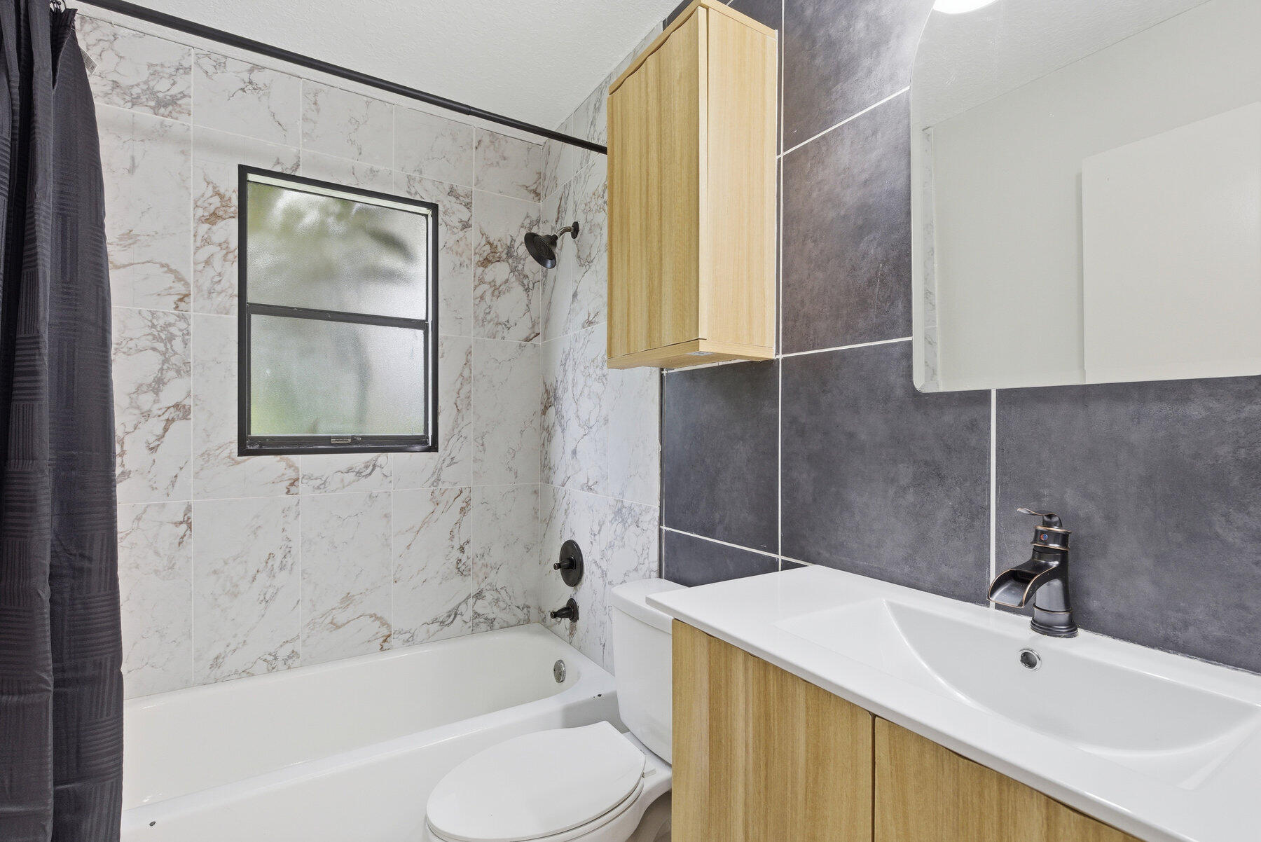 17251 38th Road North Loxahatchee, FL 33470 - Photo 22 of 35 a bathroom with a sink toilet and shower