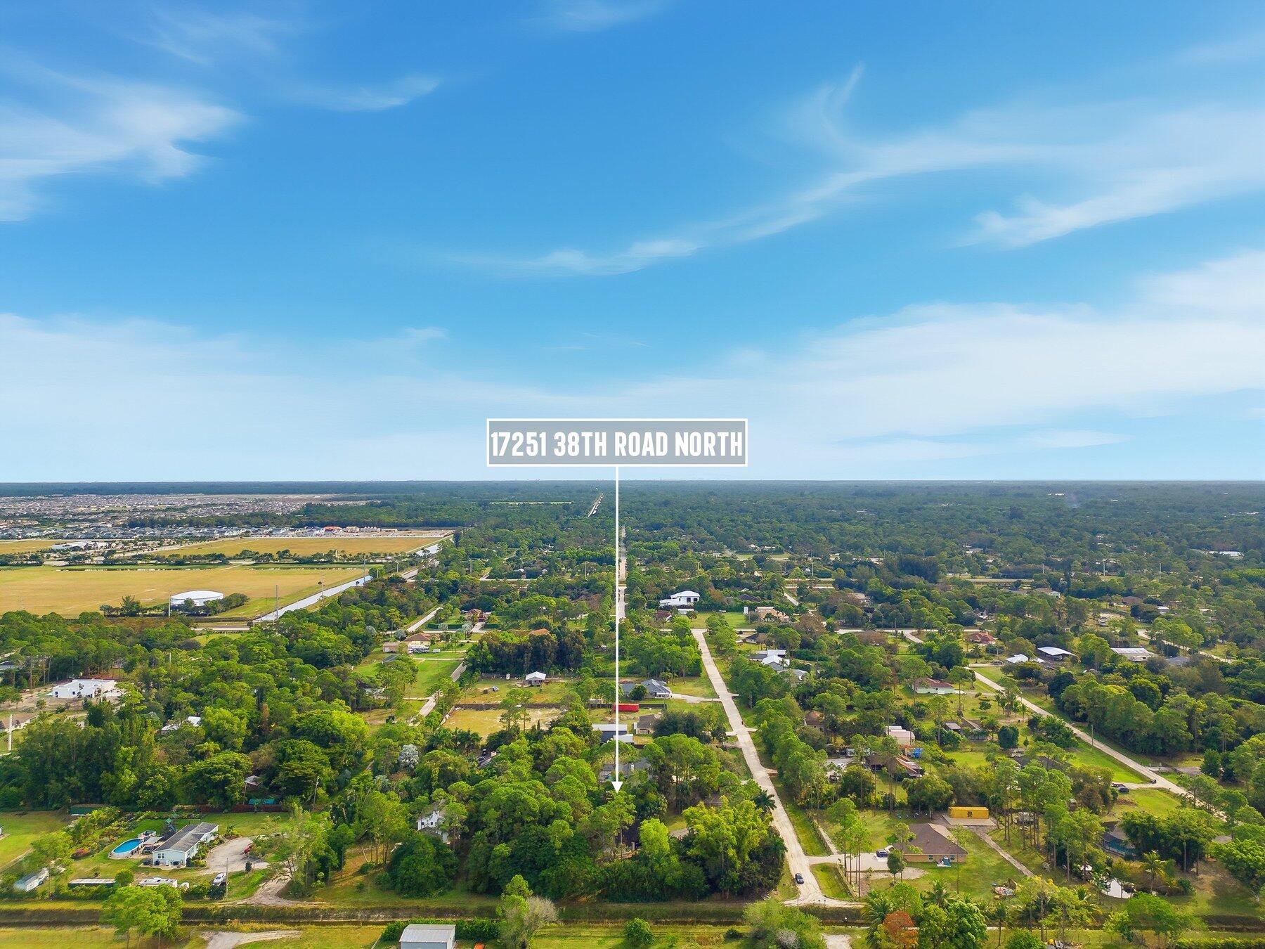 17251 38th Road North Loxahatchee, FL 33470 - Photo 32 of 35 a view of residential houses with outdoor space