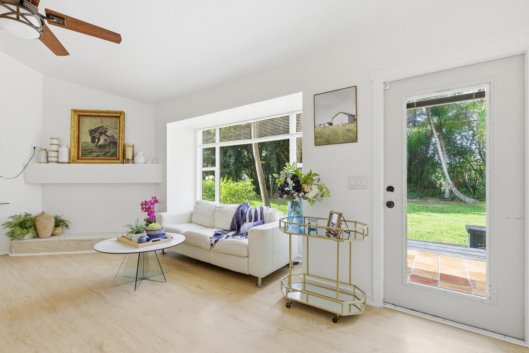 17251 38th Road North Loxahatchee, FL 33470 - Photo 4 of 35 a living room with furniture and a large window