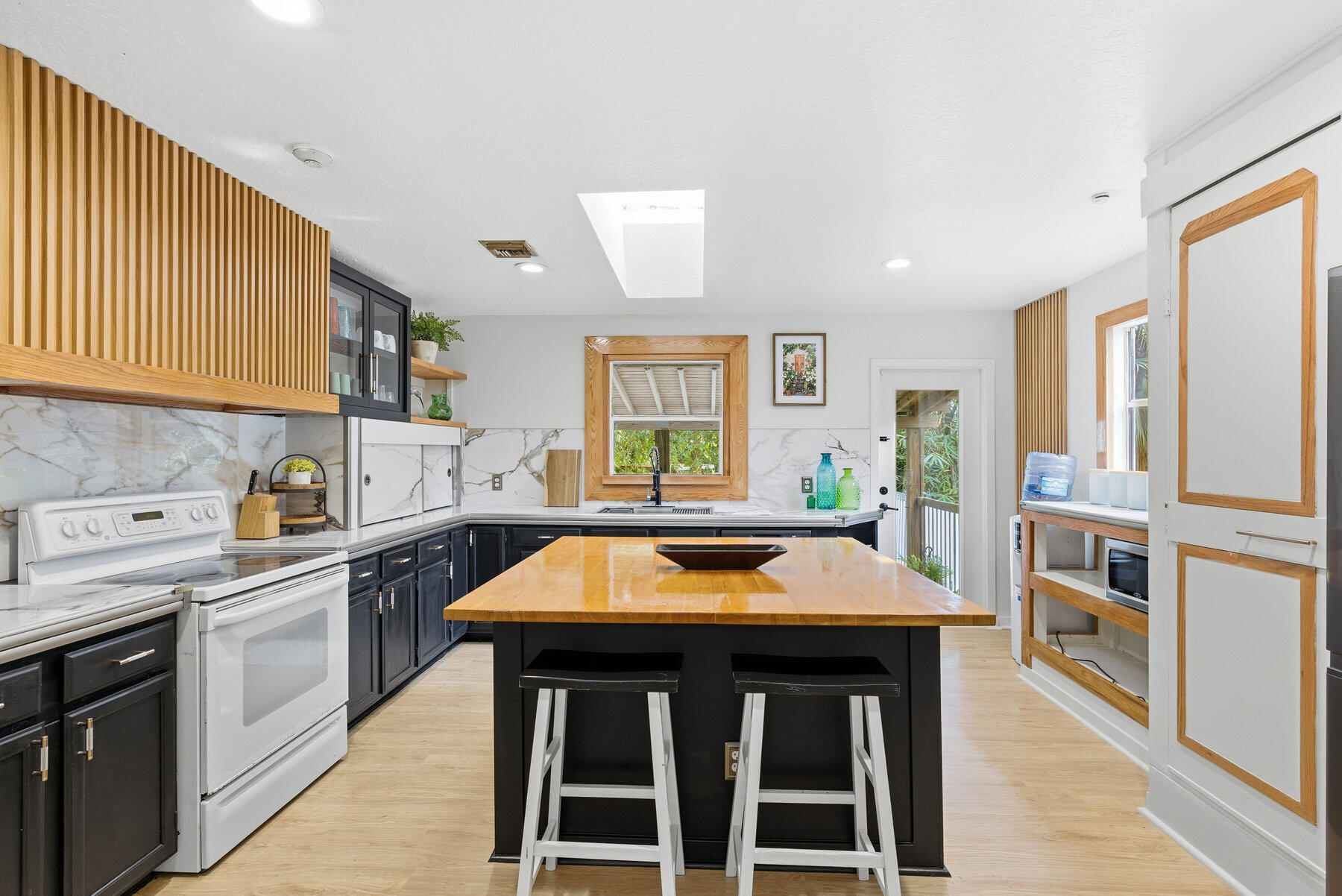 17251 38th Road North Loxahatchee, FL 33470 - Photo 10 of 35 a kitchen with a sink cabinets and window