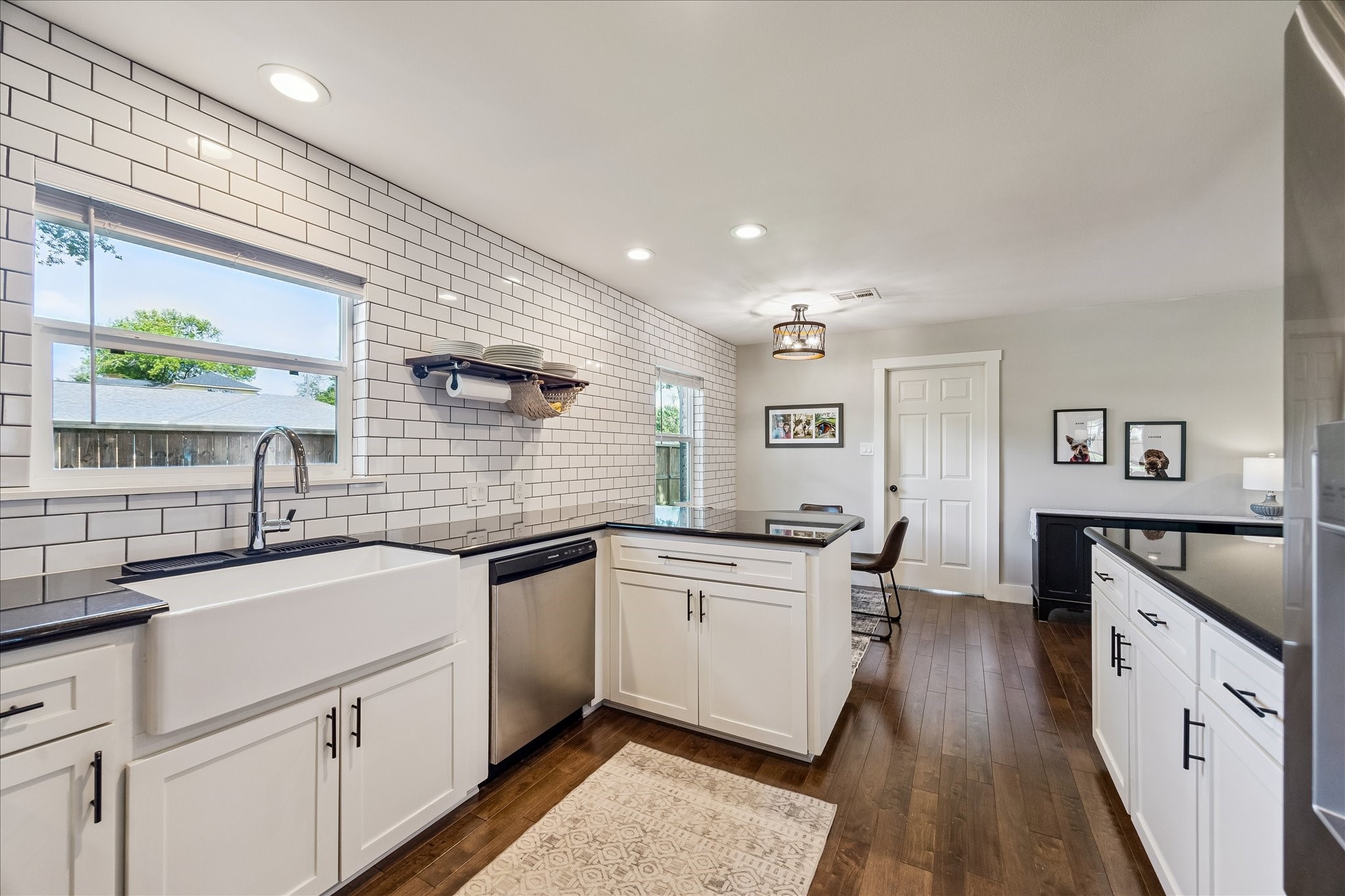 2203 Lamonte Lane Houston, TX 77018 - Photo 7 of 25 a kitchen with a sink stove and cabinets