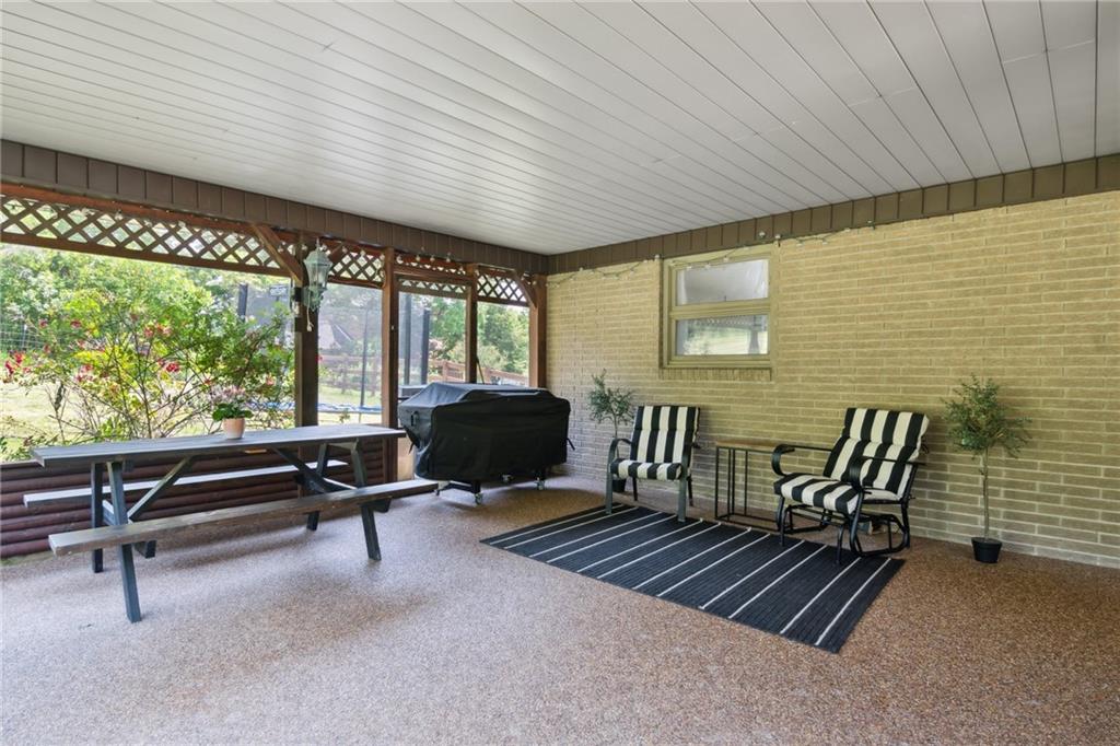 1343 Venetia Road Eighty Four, PA 15330 - Photo 13 of 27 a balcony with furniture and large windows